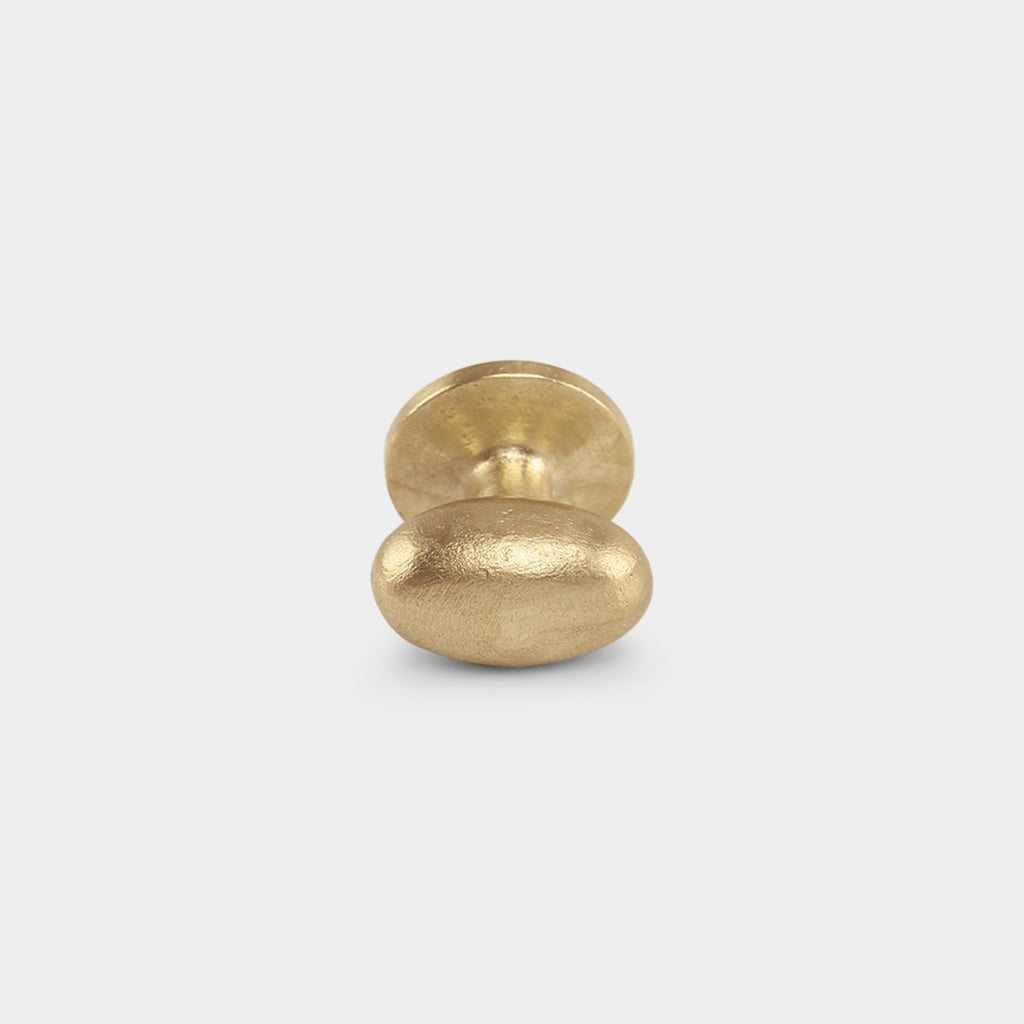 Brass Ruhlmann drawer knob with classic, elegant detailing.