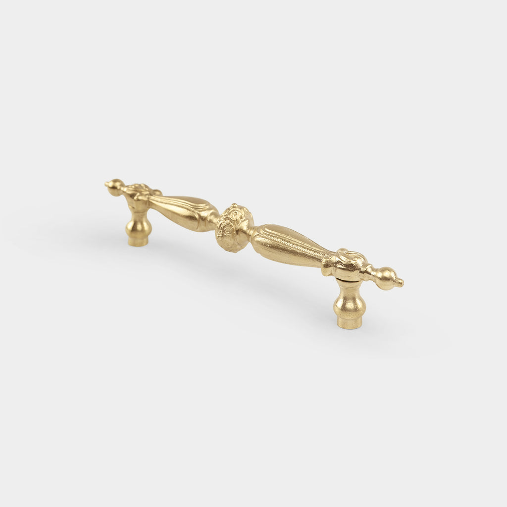 Sene elegant brass closet pull, exuding sleek and modern design, ideal for contemporary spaces